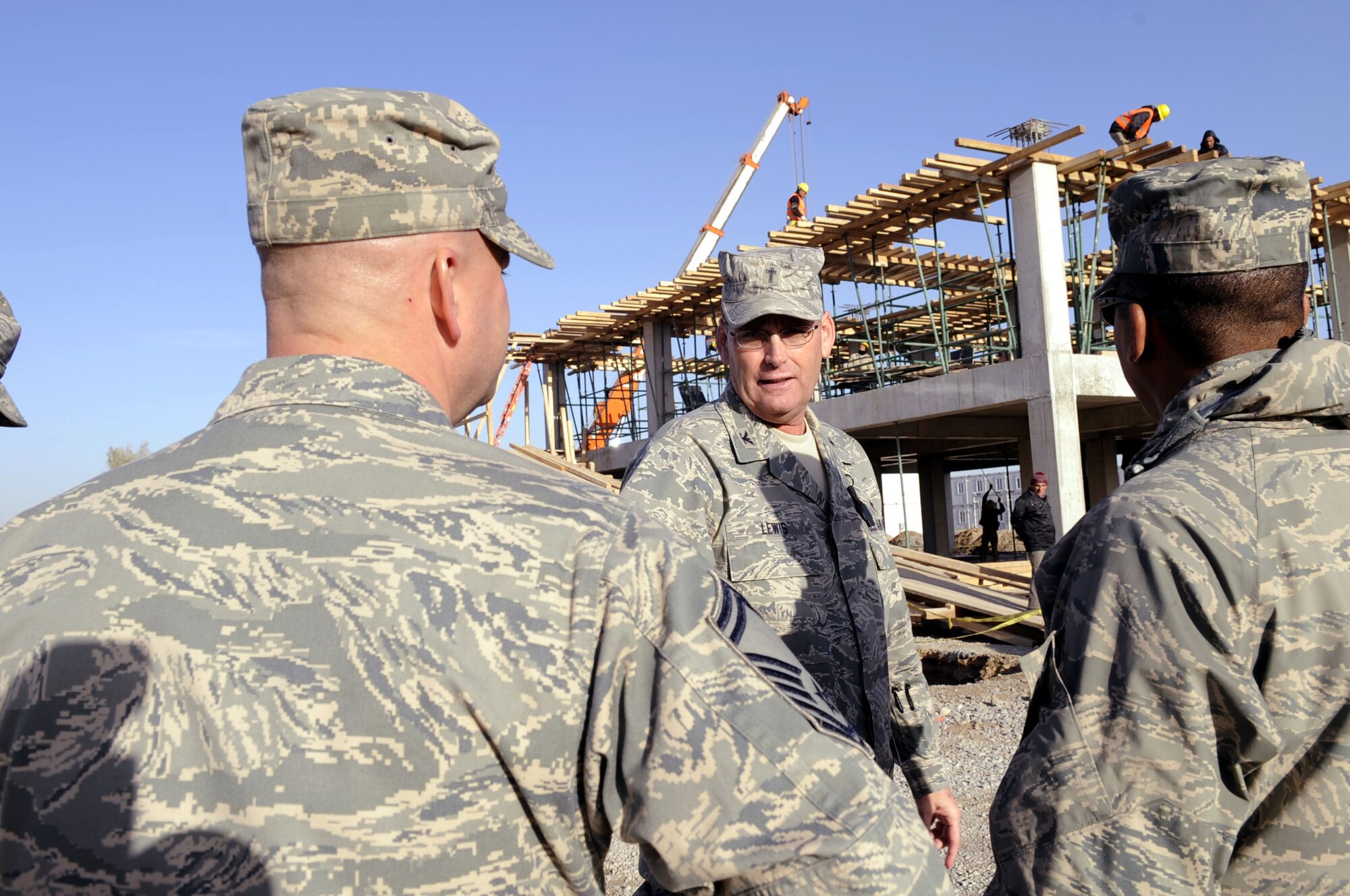 Chaplain (Col.) Jerry Lewis, U.S. Central Command chaplain, visits the Camp losano construction site of the new 451st Air Expeditionary Wing grounds here Feb. 9, 2010.  This area has been under construction since October 2009.  It will include the new wing building, modular housing, and gymnasium.  (U.S. Air Force photo by Senior Airman Nancy Hooks/Released)