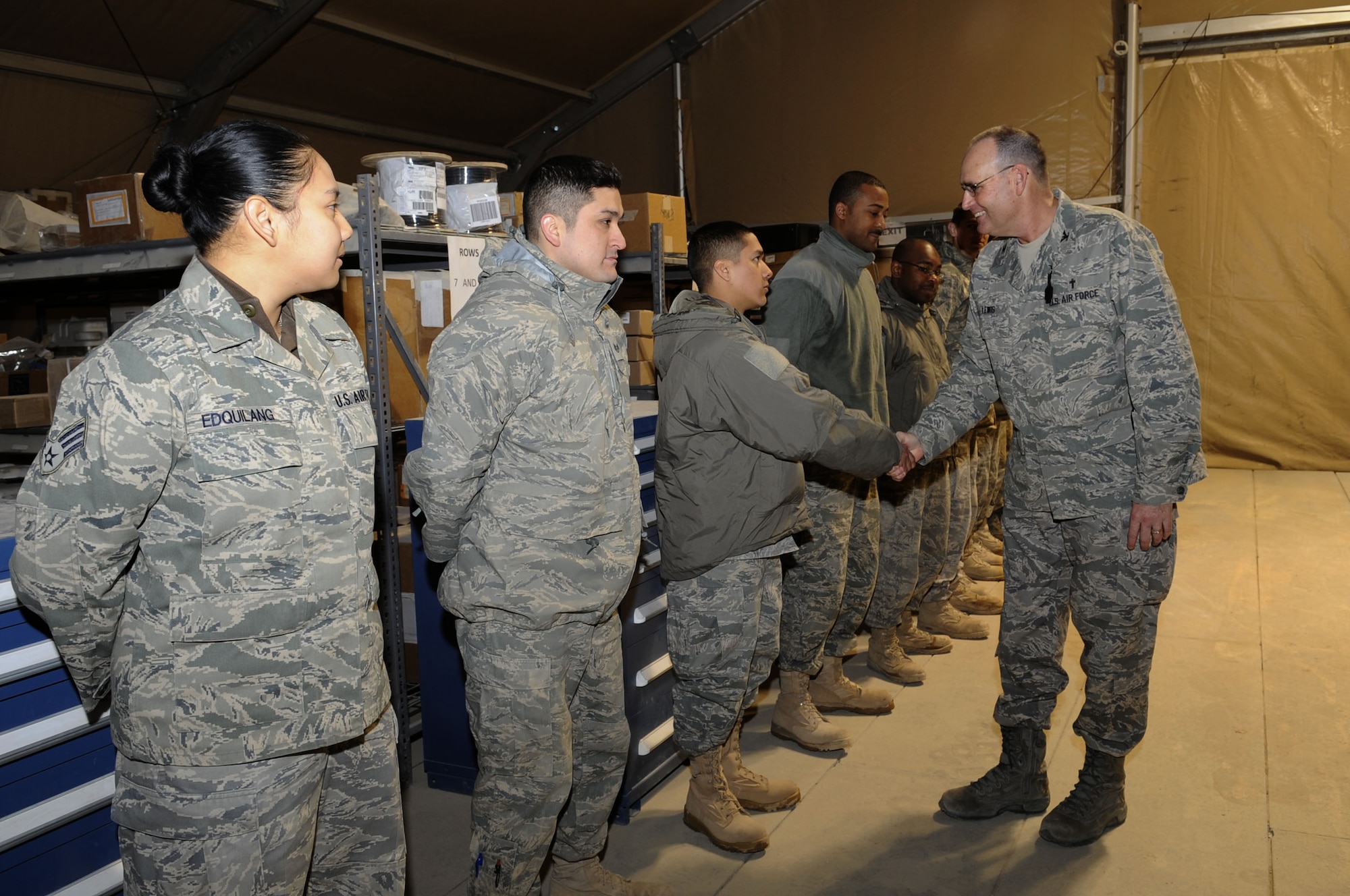 Chaplain (Col.) Jerry Lewis, U.S. Central Command chaplain, visits airmen from the 451st Logistics Readiness Squadron during his stay here Feb. 9, 2010.  Chaplain Lewis provides functional oversight, pastoral care, administrative support, and visitation to Chaplain Corps personnel at 26 locations supporting 22,000 Air Force members in the USCENTCOM AOR.  (U.S. Air Force photo by Senior Airman Nancy Hooks/Released)