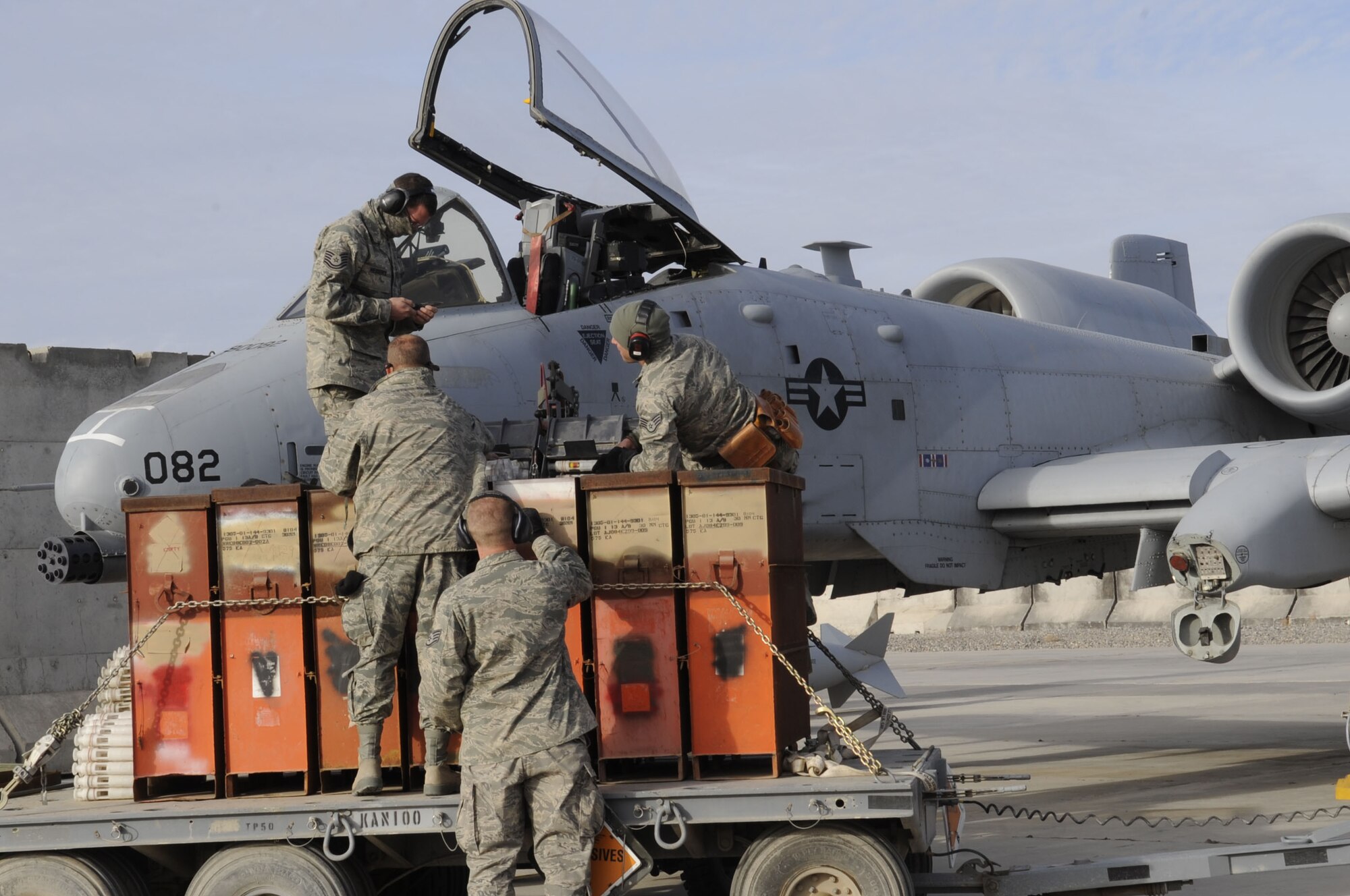Members from the 451st Expeditionary Aircraft Maintenance Squadron reload the A-10 Thunderbolt II 30mm GAU-8/A Avenger Gatling gun here Feb. 11, 2010.  This is the A-10s primary built-in weapon which can hold up to 1,350 rounds of 30 mm ammunition.  (U.S. Air Force photo by Senior Airman Nancy Hooks/Released)