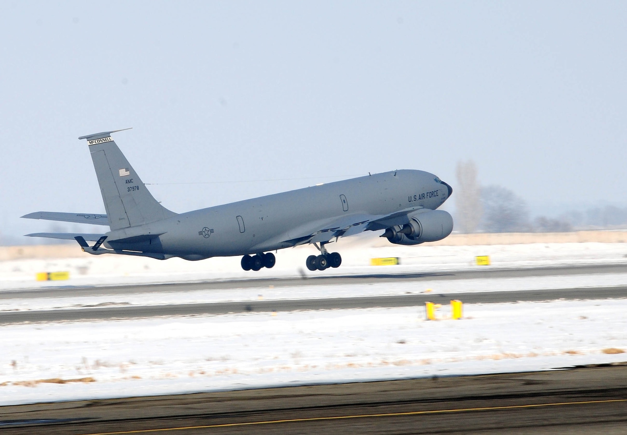 A KC-135 Stratotanker from the 22nd Expeditionary Air Refueling Squadron takes off from the Transit Center at Manas, Kyrgyzstan, Feb. 16, 2010. Due to the fuel the Transit Center provides, Fighters, bombers and other combat support aircraft provide overwatch for troops on the ground, protecting the war fighters and deterring the enemy.  (U.S. Air Force photo/Senior Airman Nichelle Anderson/released)