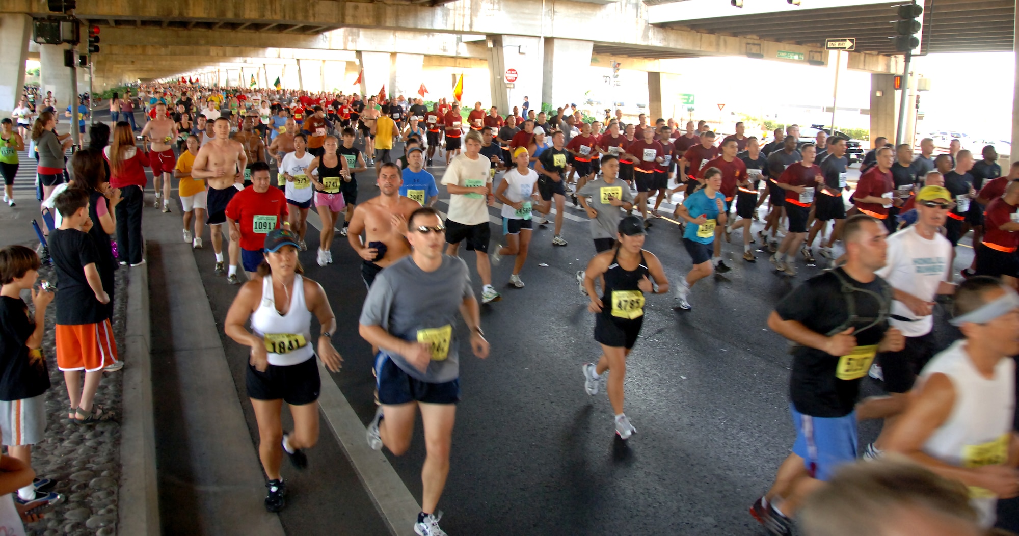 Participants of the Great Aloha Run race toward the finish line Feb. 15. The run began at Aloha Tower, finished at Aloha Stadium, and boasted more than 17,000 participants. (U.S. Air Force photo by Senior Airman Nathan Allen)