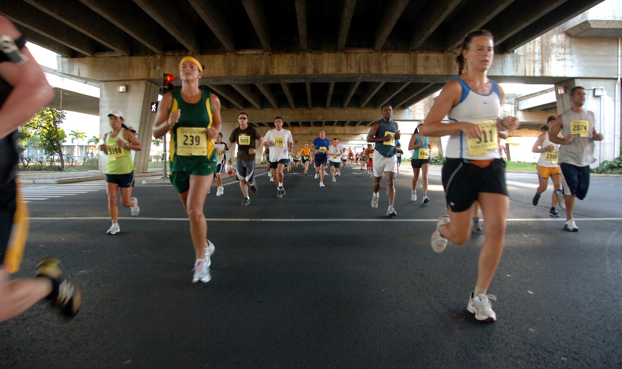 Participants of the Great Aloha Run race toward the finish line Feb. 15. The run began at Aloha Tower, finished at Aloha Stadium, and boasted more than 17,000 participants. (U.S. Air Force photo by Senior Airman Nathan Allen)