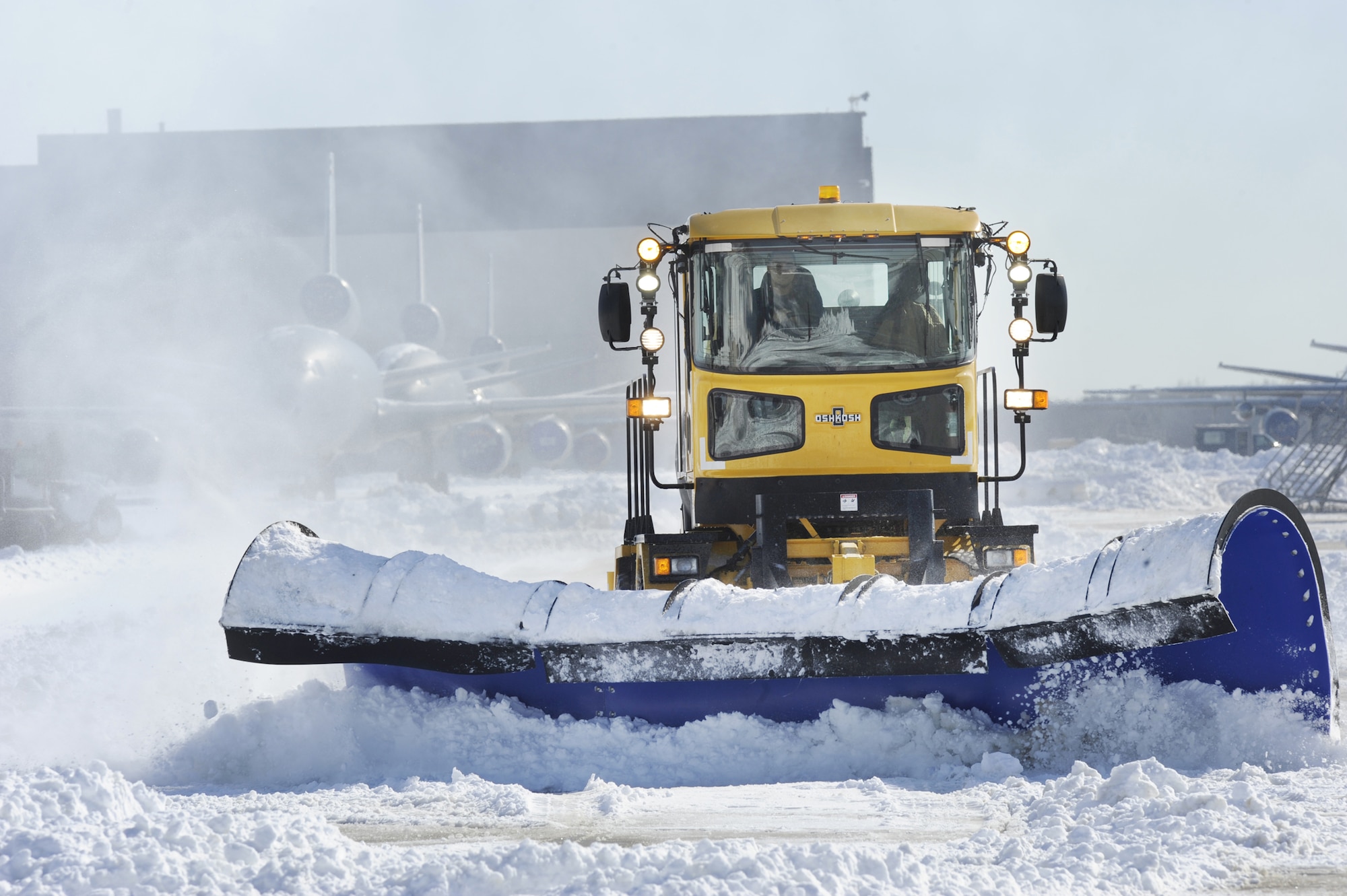 Members of the 87th Civil Engineer Squadron heavy equipment shop were out in force Feb. 12 removing tons of snow from the airfield runways, taxiways and parking ramps after a snow storm dumped 12-18 inches of snow in the area. The snowplows were running "around the clock" to remove snow from streets and parking lots at Joint Base McGuire-Dix-Lakehurst, N.J. (U.S. Air Force photo Carlos Cintron)
