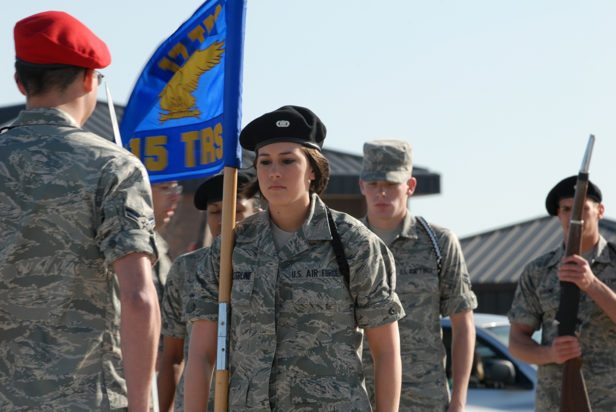 GOODFELLOW AIR FORCE BASE, Texas -- Airman Basic Chelsea Casterline, a student from the 315th Training Squadron, performs an exhibition drill with fellow black ropes drill team members during the 1st quarter drill team competition, Feb. 13, 2010. (U.S. Air Force photo/Staff Sgt. Laura R. McFarlane)
