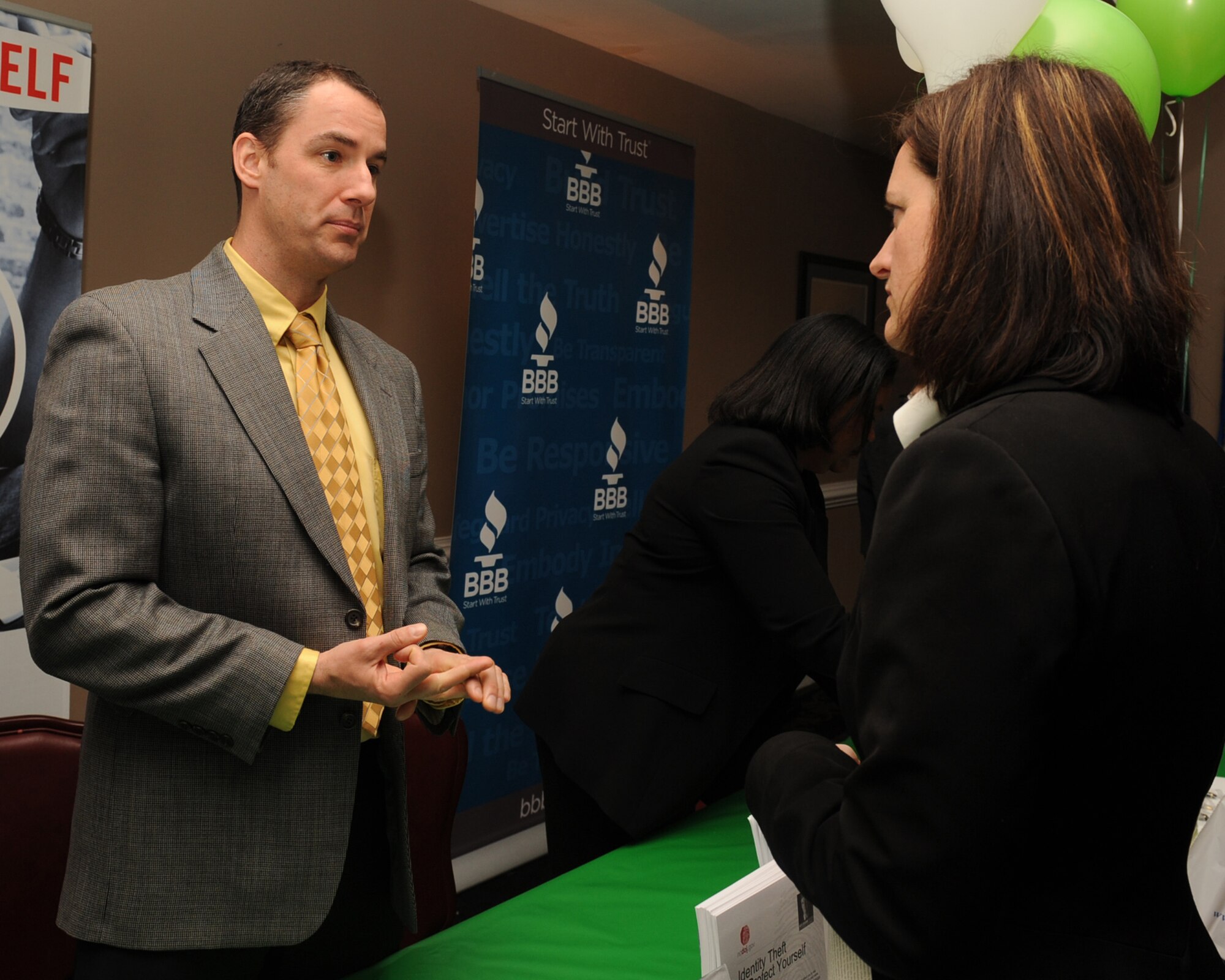 David Fox, North Carolina Department of Justice military liaison consumer protection, speaks to Janet Cowell, North Carolina State treasurer, during a financial Fair on Seymour Johnson Air Force Base, N.C., Feb. 12, 2010. Fox and Cowell discussed the importance of monitoring finances and identity protection. Federal identity theft convictions increased 26 percent in 2007. (U.S. Air Force photo/Senior Airman Whitney Lambert)