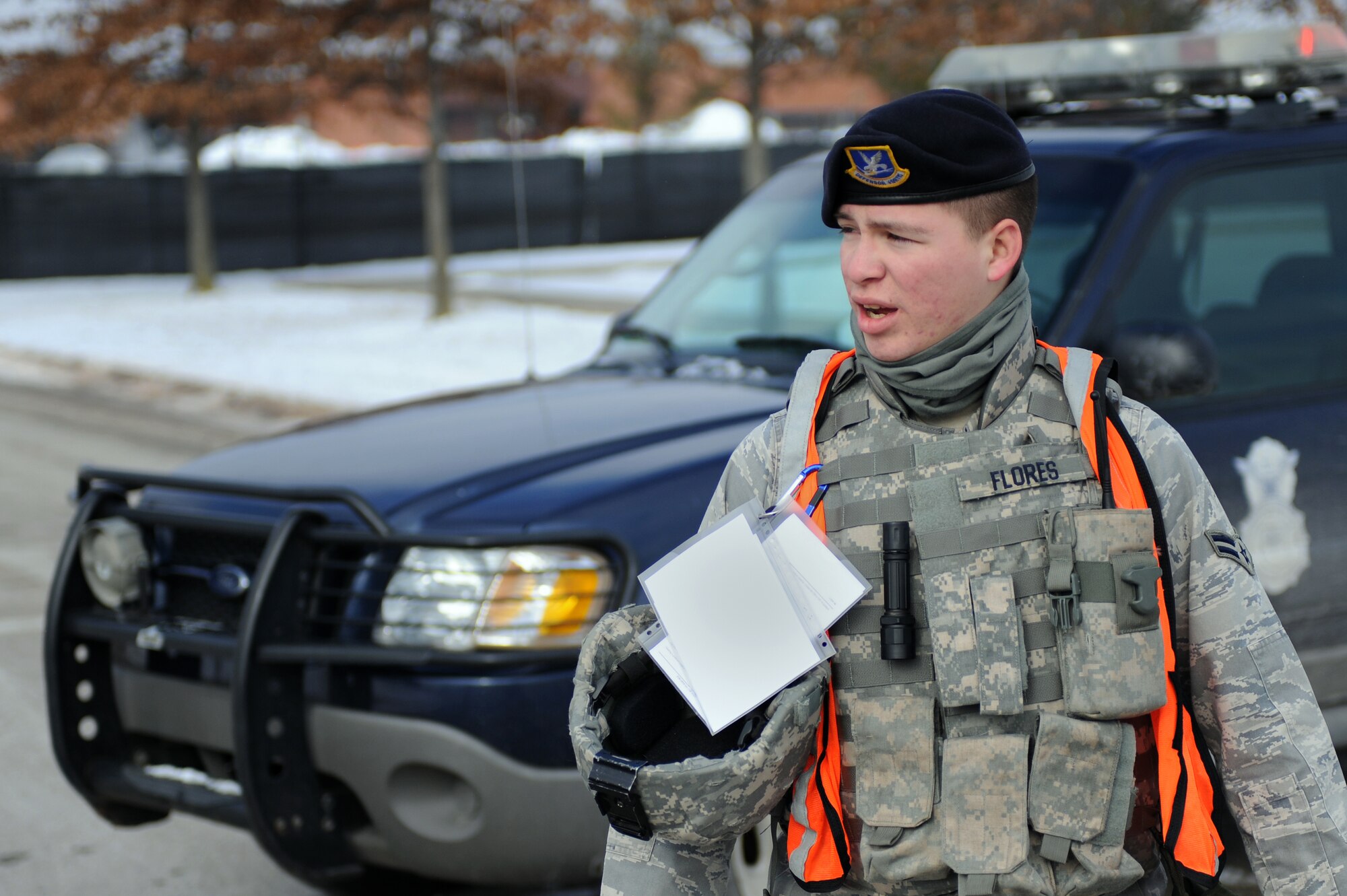 WHITEMAN AIR FORCE BASE, Mo. - Airman 1st Class Jose Flores, 509th Security Forces Squadron member, directs traffic during a massive accident response exercise Feb. 10, 2010. 509th SFS Airmen reacted to a simulated suspicious substance received by mail for the exercise. (U.S. Air Force photo/Tech. Sgt. Charles Larkin Sr)