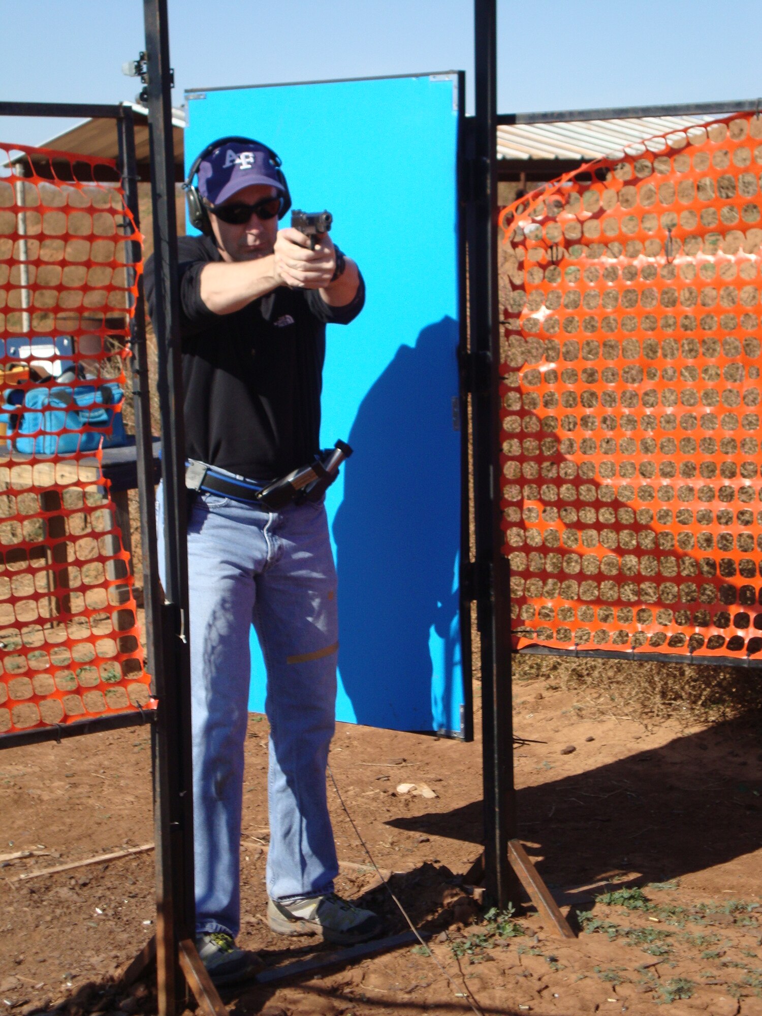 Col. Kevin Schneider, 80th Flying Training Wing commander, competes in a shooting match Nov. 28. When Colonel Schneider became a pilot, he decided he needed to be proficient with his weapon in case he is ever in a combat environment which resulted in a passion for competitive shooting. (U.S. Air Force photo) 
