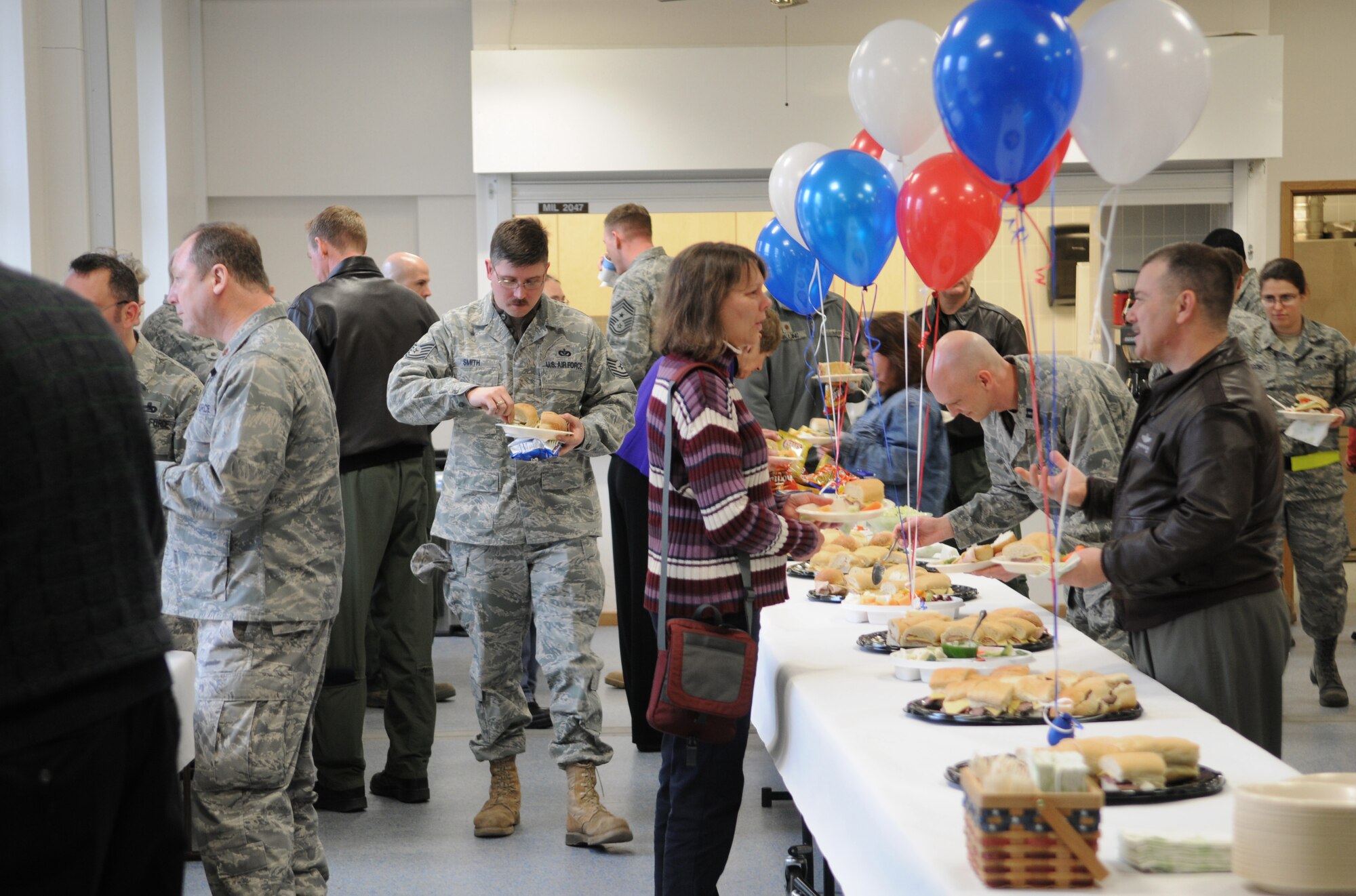 RAF MILDENHALL, England -- Attendees of this year's annual RAF Mildenhall National Prayer Luncheon socialize Feb. 12 at the 100th Air Refueling Wing Chapel. This interfaith event encourages people of all religions to incorporate prayer into their quest to attain their goals. (U.S. Air Force photo/Senior Airman Thomas Trower)