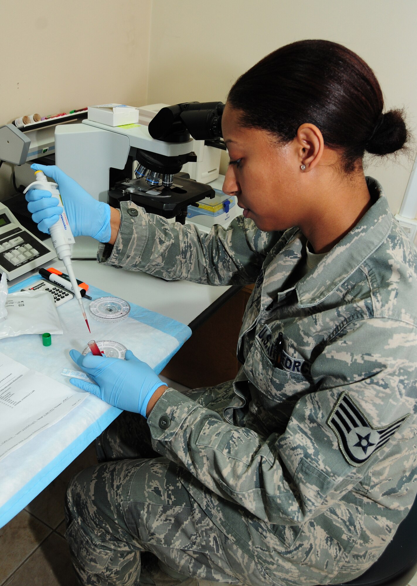 U.S. Air Force Staff Sgt. Carmen Williams, 386th Expeditionary Medical Group, uses a blood sample to test a patient's liver functions Feb. 15, 2010 at an air base in Southwest Asia. Sergeant Williams, deployed from Wright-Patterson Air Force Base, Ohio, was part of the her home unit's Air Force Medical Service Award winning Category I Laboratory Team of the Year. (U.S. Air Force photo by Staff Sgt. Lakisha A. Croley/Released)
