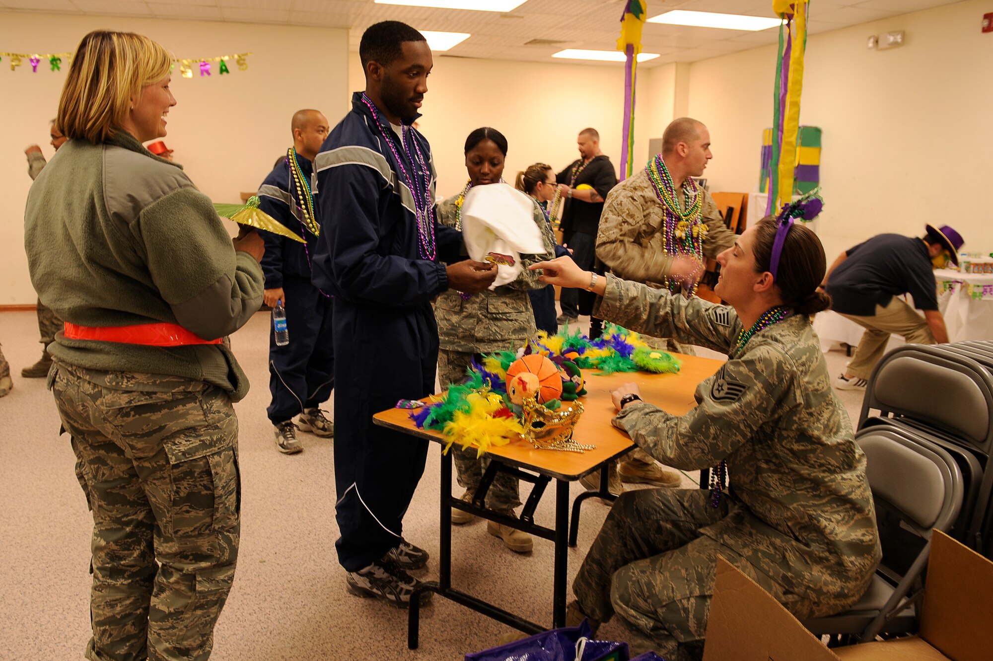 U.S. servicemembers enjoy Mardi Gras festivities at Bagram Airfield, Afghanistan, Feb. 15, 2010. (U.S. Air Force photo by/ Tech. Sgt. Jeromy K. Cross/released)




