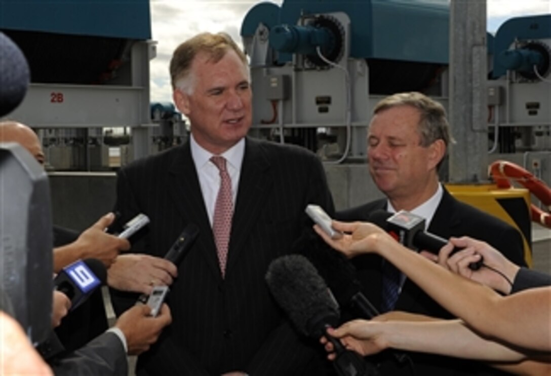 Deputy Secretary of Defense William J. Lynn III answers questions after receiving a tour of Techport, one of the most modern shipbuilding plants in the world and the $300 million investment in Australia's Defense, during the opening of the common user facility in Adelaide, South Australia, on Feb. 15, 2010.  