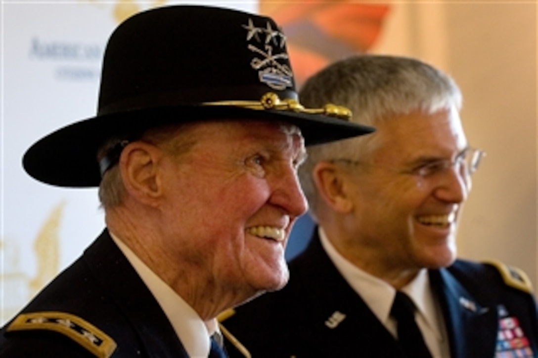 Retired Army Lt. Gen. Harold Moore and Chief of Staff of the Army Gen. George W. Casey Jr. answer questions during a press conference at the conclusion of the American Citizenship Trust National Freedom ceremony in Montevallo Ala., on Feb. 15, 2010.  Moore, who was portrayed by Mel Gibson in the movie "We were Soldiers" was the first recipient of the National Freedom Award, gave the keynote address during this years presentation to the joint recipients Maj. Gen. George W. Casey Sr., posthumously, and Gen. George W. Casey Jr.  