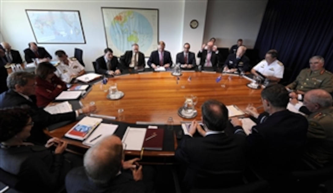 Deputy Secretary of Defense William J. Lynn III meets with a special defense committee hosted by Australian Secretary of Defense Watt and Air Chief Marshal Houston at the Russell Defense Complex in Canberra, Australia, on Feb. 16, 2010.  