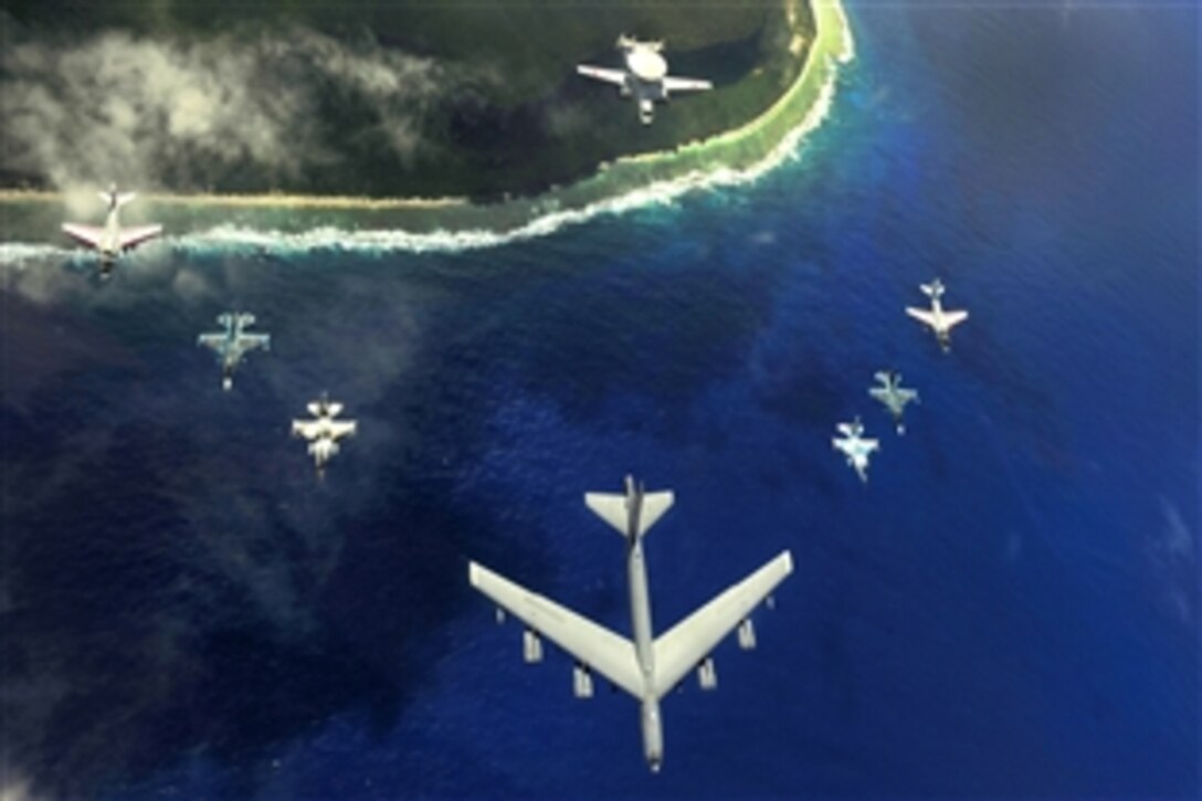 A U.S. Air Force B-52 Stratofortress leads a formation of two F-16 Fighting Falcons, two Japan Air Self-Defense Force F-2 attack fighters, two U.S. Navy EA-6B Prowlers and an E-2C Hawkeye over Guam during Exercise Cope North, Feb. 15, 2010.