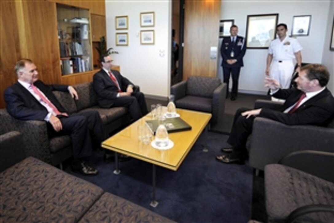 U.S. Deputy Defense Secretary William J. Lynn III and Deputy Assistant Secretary of Defense Robert Scher meet with Australian Defense Secretary Ian J. Watt and Air Chief Marshal Allan Grant "Angus" Houston at the Russell Defense Complex in Canberra, Australia, Feb. 16, 2010. 