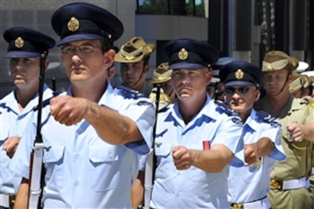 An Australian Honor Guard prepares for the arrival of U.S. Deputy Defense Secretary William J. Lynn III at the Russell Defense Complex in Canberra, Australia, Feb. 16, 2010. 