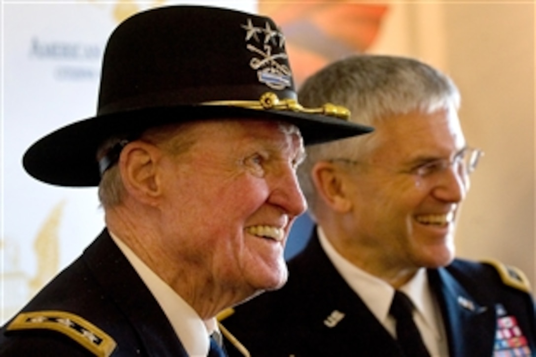 Retired Army Lt. Gen. Harold Moore and Army Chief of Staff Gen. George W. Casey Jr. answer questions during a press conference after the American Citizenship Trust  National Freedom ceremony in Montevallo, Ala.,  Feb. 15, 2010. Moore, portrayed by Mel Gibson in the movie ,"We were Soldiers," gave the keynote address during this year's presentation to the joint recipients: Maj. Gen. George W. Casey Sr., posthumously, and Casey Jr.