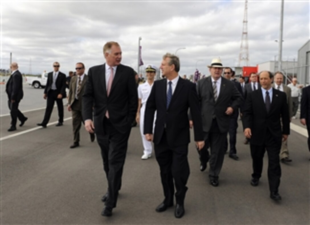 Deputy Secretary of Defense William J. Lynn III receives a tour of Techport, one of the most modern shipbuilding plants in the world and the $300 million investment in Australia's Defense, from Premier Mike Rann during the opening of the common user facility in Adelaide, South Australia, on Feb. 15, 2010.  