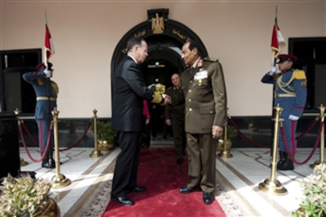 Chairman of the Joint Chiefs of Staff Adm. Mike Mullen, U.S. Navy, bids farewell to Egyptian Armed Forces Commander-in-Chief Field Marshal Mohamed Hussein Tantawi in Egypt on Feb. 14, 2010.  Mullen is on a weeklong tour of the region visiting with key partners and allies.  