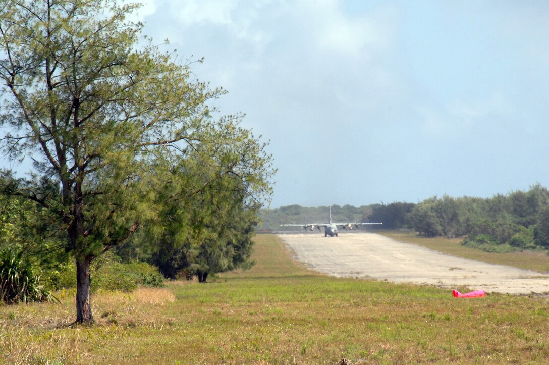 A C-130 Hercules prepares for take-off at Northwest Field, next to Andersen Air Force Base, Guam, Feb. 17.  The 36th Contingency Response Group at Andersen and the 374th Operations Group from Yokota Air Base, Japan, participated in a mock deployment to Northwest Field to rehearse time-critical actions for disaster relief operations.
(USAF photo by Capt. Andrew G. Hoskinson)