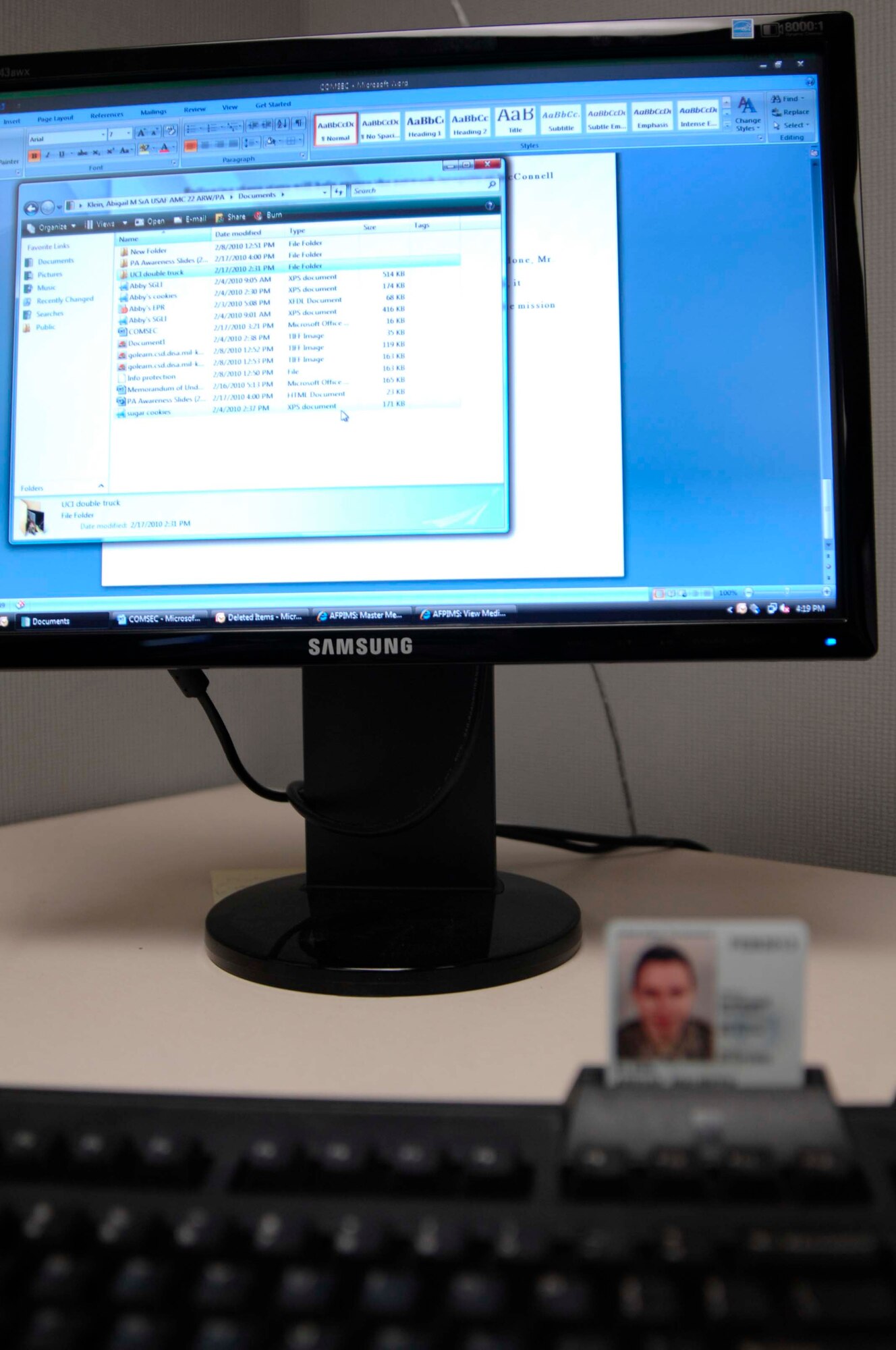 A U.S. Air Force Common Access Card sits unattended in a card reader. Leaving a CAC card in the reader can allow someone unauthorized access to the network and risk computer security. (U.S. Air Force photo/Senior Airman Abigail Klein)