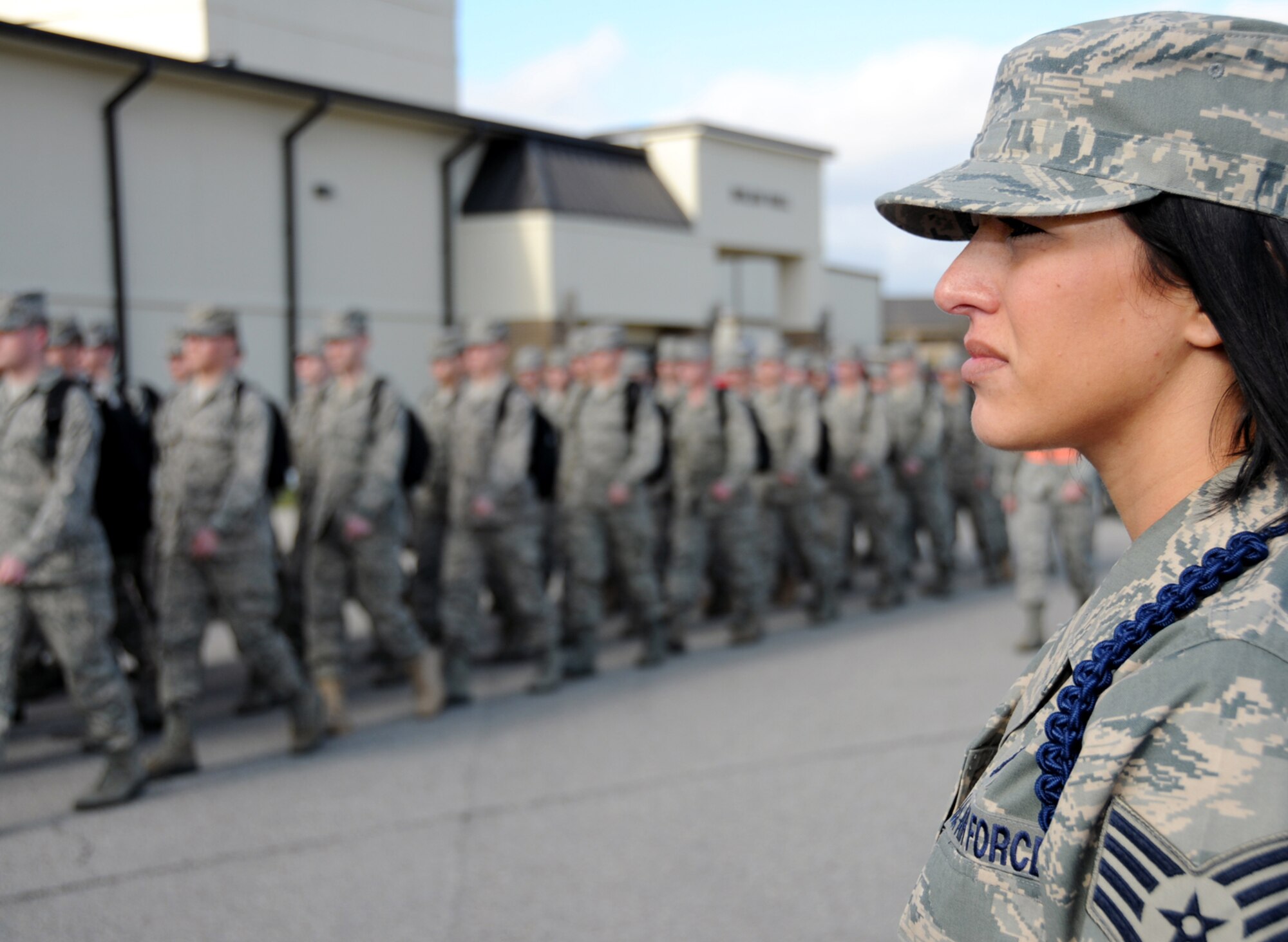 Staff Sgt. Erin Peña, an MTL in the 332nd TRS, supervises nonprior service technical training students as they march back to the Triangle Feb. 9 after classes end for the day at Dolan Hall.  There are currently 55 MTLs assigned to the 81st Training Group.(U.S. Air Force photo by Kemberly Groue)