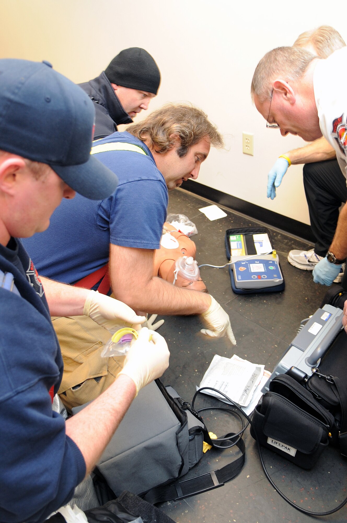 BUCKLEY AIR FORCE BASE, Colo. -- Buckley firefighters prepare a defibulator Feb. 16 as Team Buckley prepares for the upcoming Operational Readiness Inspection. ( U.S. Air Force Photo by Airman 1st Class Marcy Glass )
