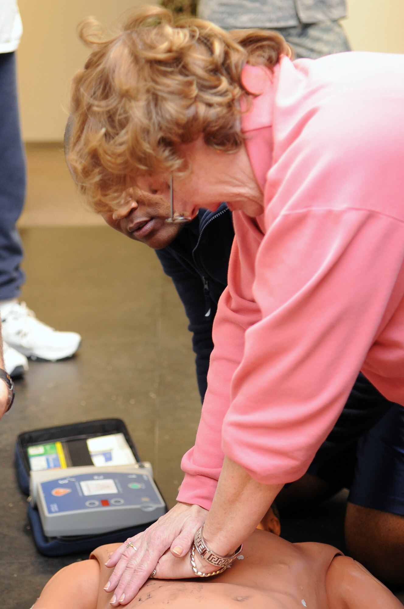 BUCKLEY AIR FORCE BASE, Colo. -- Members of Team Buckley administer CPR to a training dummy Feb. 16 as Team Buckley prepares for the upcoming Operational Readiness Inspection. ( U.S. Air Force Photo by Airman 1st Class Marcy Glass )
