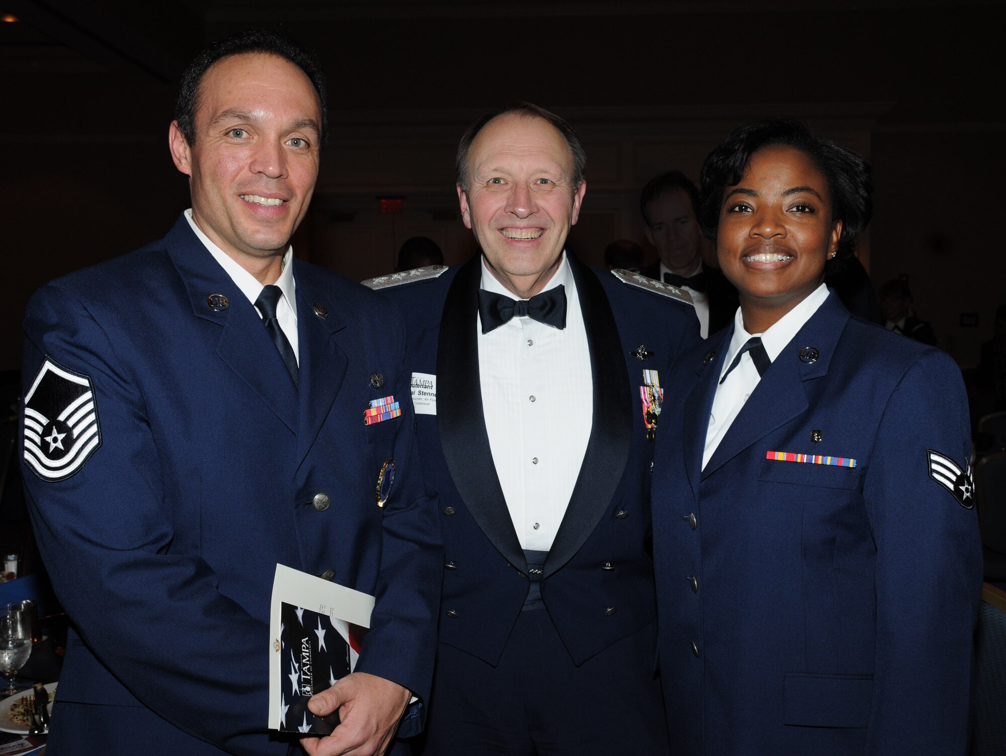 Lt. Gen. Charles E. Stenner Jr., Chief of Air Force Reserve, Headquarters U.S. Air Force, Washington, D.C., and Commander, Air Force Reserve Command, Robins Air Force Base, Ga with award winners Master Sgt. Kevin M. French Jr., and Senior Airman Angela McNealy-Simmons, at the Tampa Chamber of Commerce Military Appreciation Banquet on Feb. 16, 2010. (U.S. Air Force photo/Tech.Sgt. Denise Hauser) 