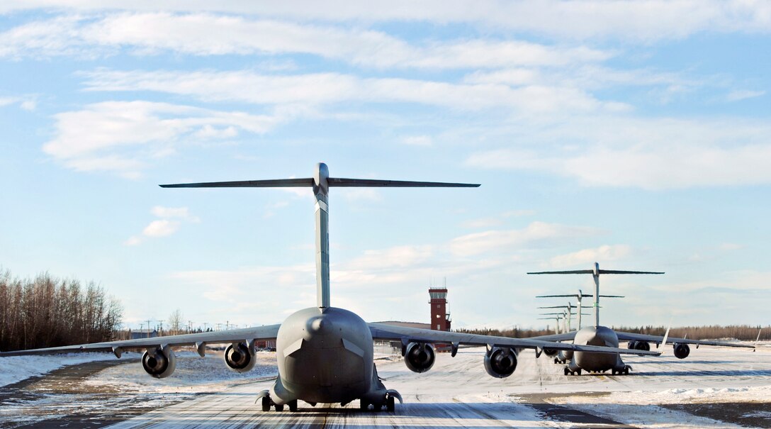 A C-17 Globemaster III waits to take off at Fort Greely, Alaska, Feb. 10, 2010, during Exercise Pacific Rendezvous. The aircraft was participating in an exercise that involved C-17s from Pacific Air Forces and Air Mobility Command exploring capabilities in large formations. (U.S. Air Force photo/Senior Airman Matt Coleman-Foster)