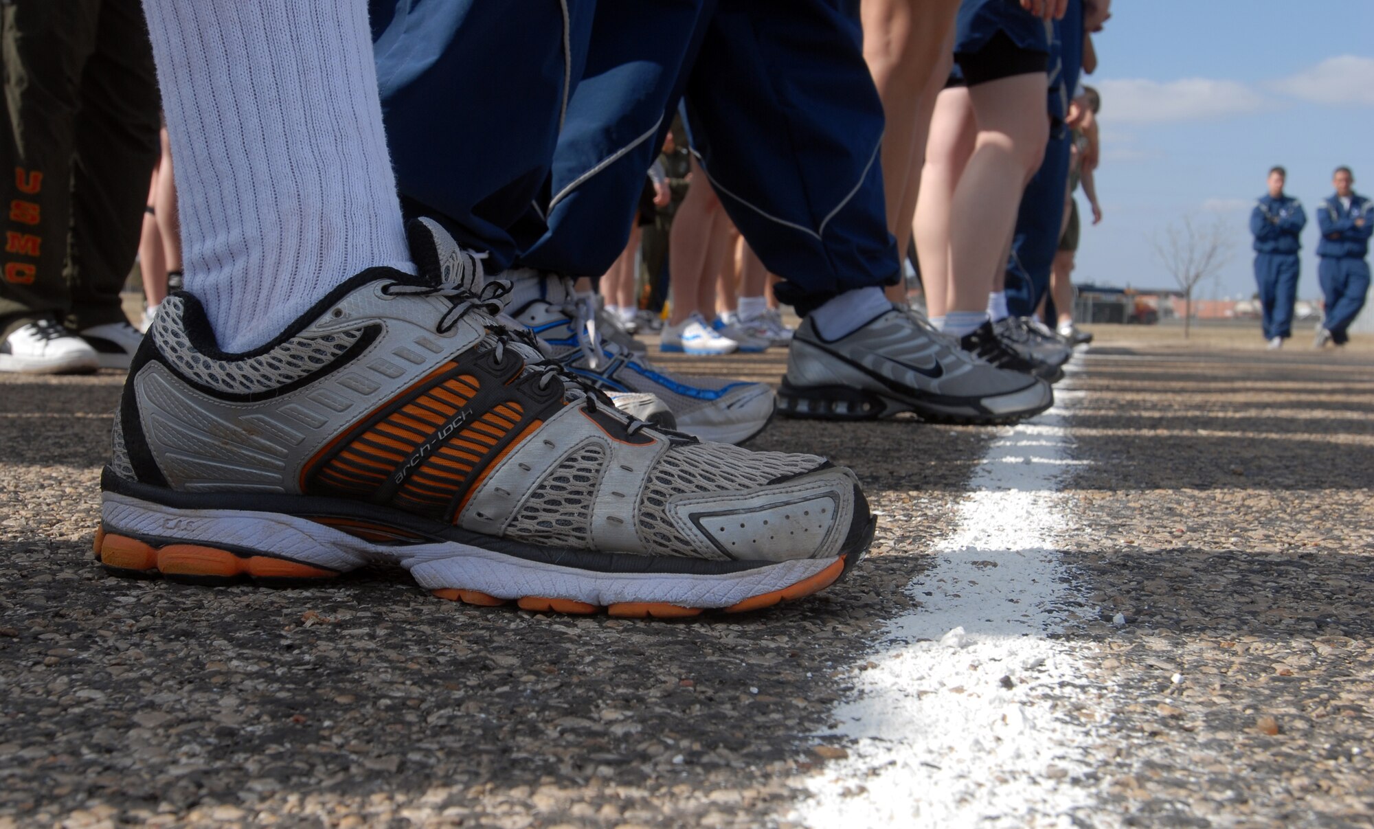 Members of Goodfellow AFB, Texas line up for the start of the 5k road race during the 17th Training Wing Sports Day on Feb. 12. Goodfellow took the day to hold multiple sporting events, including volleyball, tennis, and dodge ball, with each unit competing for commander’s cup points.  (U.S. Air Force photo/Master Sgt. Randy Mallard)
