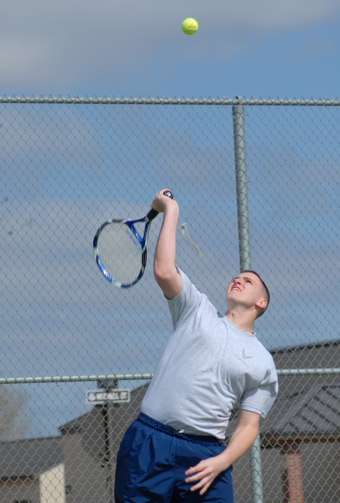 1st Lt. Willard Schupbach, 17th Mission Support Group, serves up the ball during a tennis match as part of the 17th Training Wing Sports Day on Feb. 12. Goodfellow AFB, Texas took the day to hold multiple sporting events, including volleyball, tennis, and dodge ball, with each unit competing for commander’s cup points.  (U.S. Air Force photo/Master Sgt. Randy Mallard)