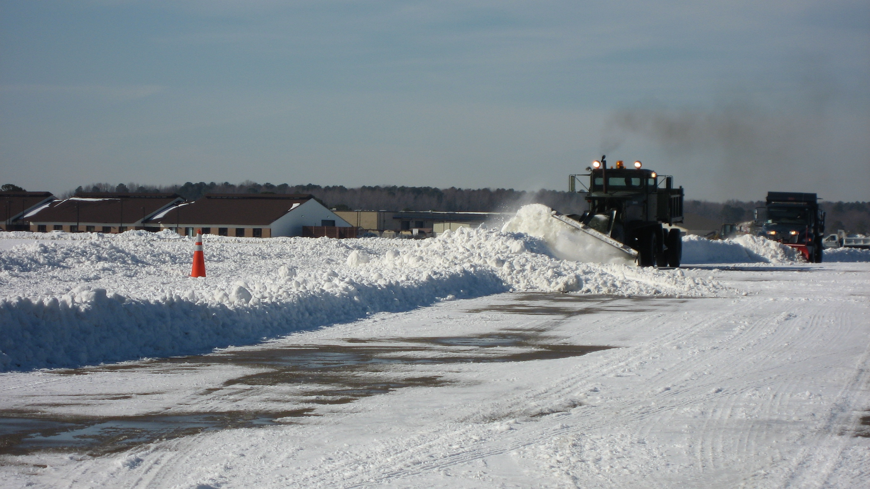 Civil engineers battle snowfall, keep missions underway > Joint Base