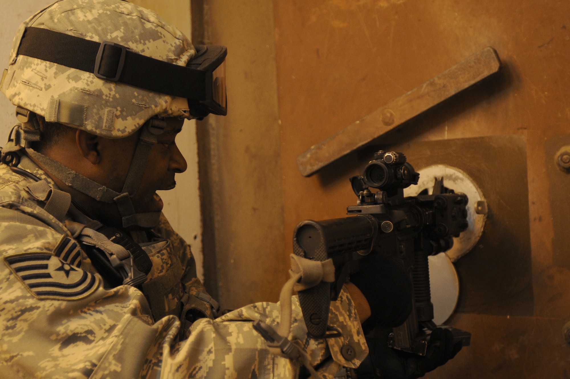Tech. Sgt. Daniel Mayhorn, 39th Security Forces Squadron, uses an M-4 Carbine to apply harassment fire against intruders during an exercise Thursday, Feb.11, 2010 on Incirlik Air Base, Turkey.  Bases conduct exercises to ensure all military personnel are mission ready for real world events.  (U.S. Air Force photo/Senior Airman Ashley Wood)