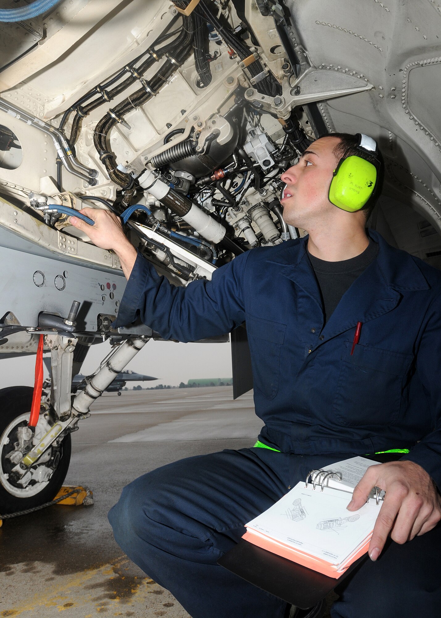 Staff Sgt.  Jose Zaragoza, 555th Aircraft Maintenance Unit crew chief, inspects an F-16 February 4, 2010, at Zaragoza Air Base, Spain.  Crew chiefs from the 555th Fighter Squadron maintained 16 aircrafts during this training deployment.  (U.S. Air Force photo/Senior Airman Tabitha M. Mans)