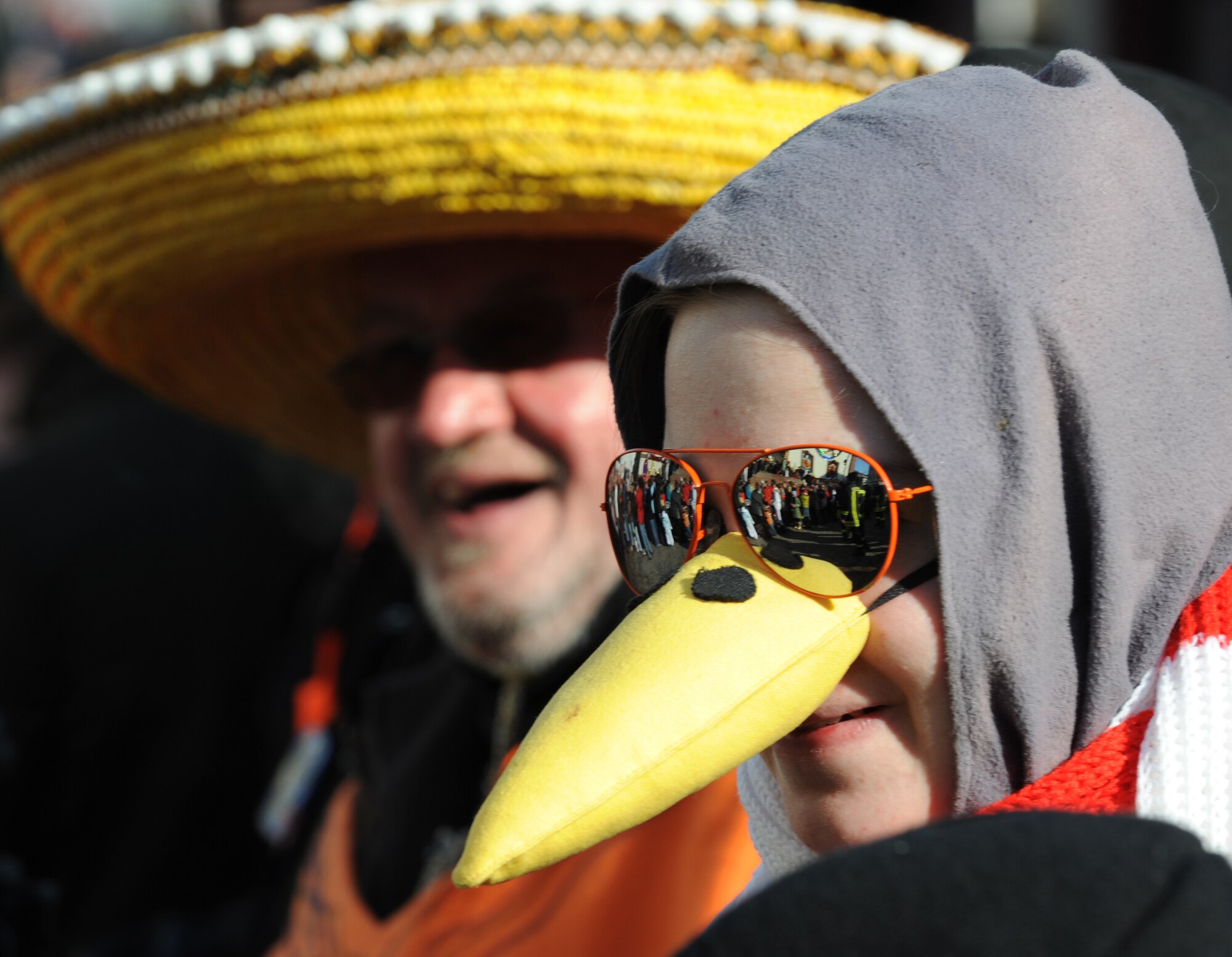 German and Kaiserslautern Military Community members come out to enjoy the annual Fasching parade in Ramstein village, Germany, Feb. 16, 2010. This annual event is a pre-Lenten carnival which is celebrated with the donning of wild and fancy costumes to chase away the evil spirits of winter in preparation for spring. (U.S. Air Force photo by Airman 1st Class Caleb Pierce)