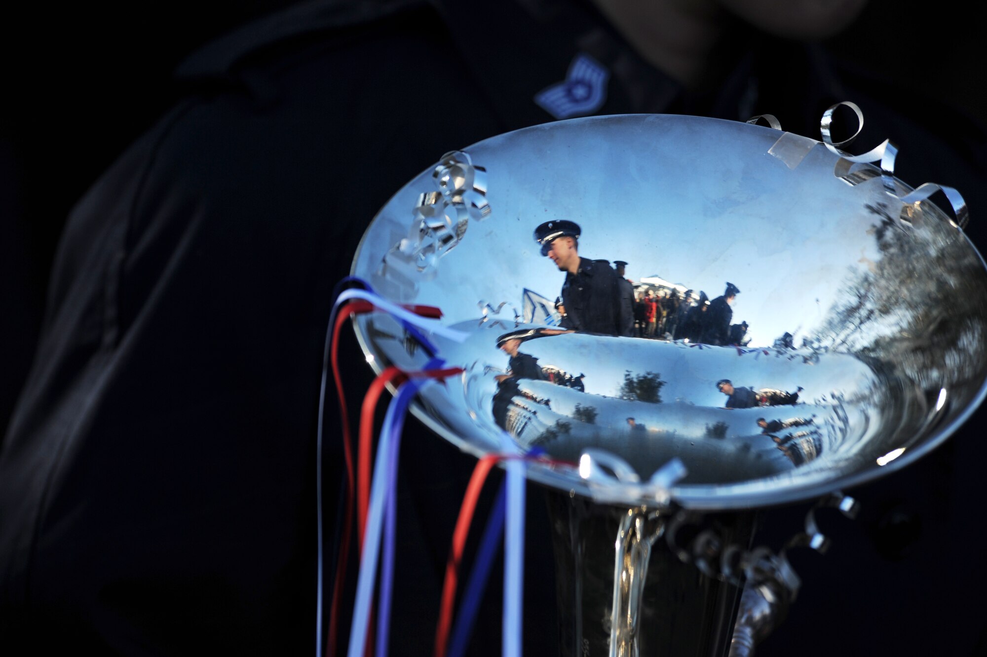 Members of the U.S. Air Forces Band stand ready prior to the Fasching parade in Ramstein village, Germany, Feb. 16, 2010. This annual event is a pre-Lenten carnival which is celebrated with the donning of wild and fancy costumes to chase away the evil spirits of winter in preparation for spring. (U.S. Air Force photo by Tech. Sgt. Sarayuth Pinthong)