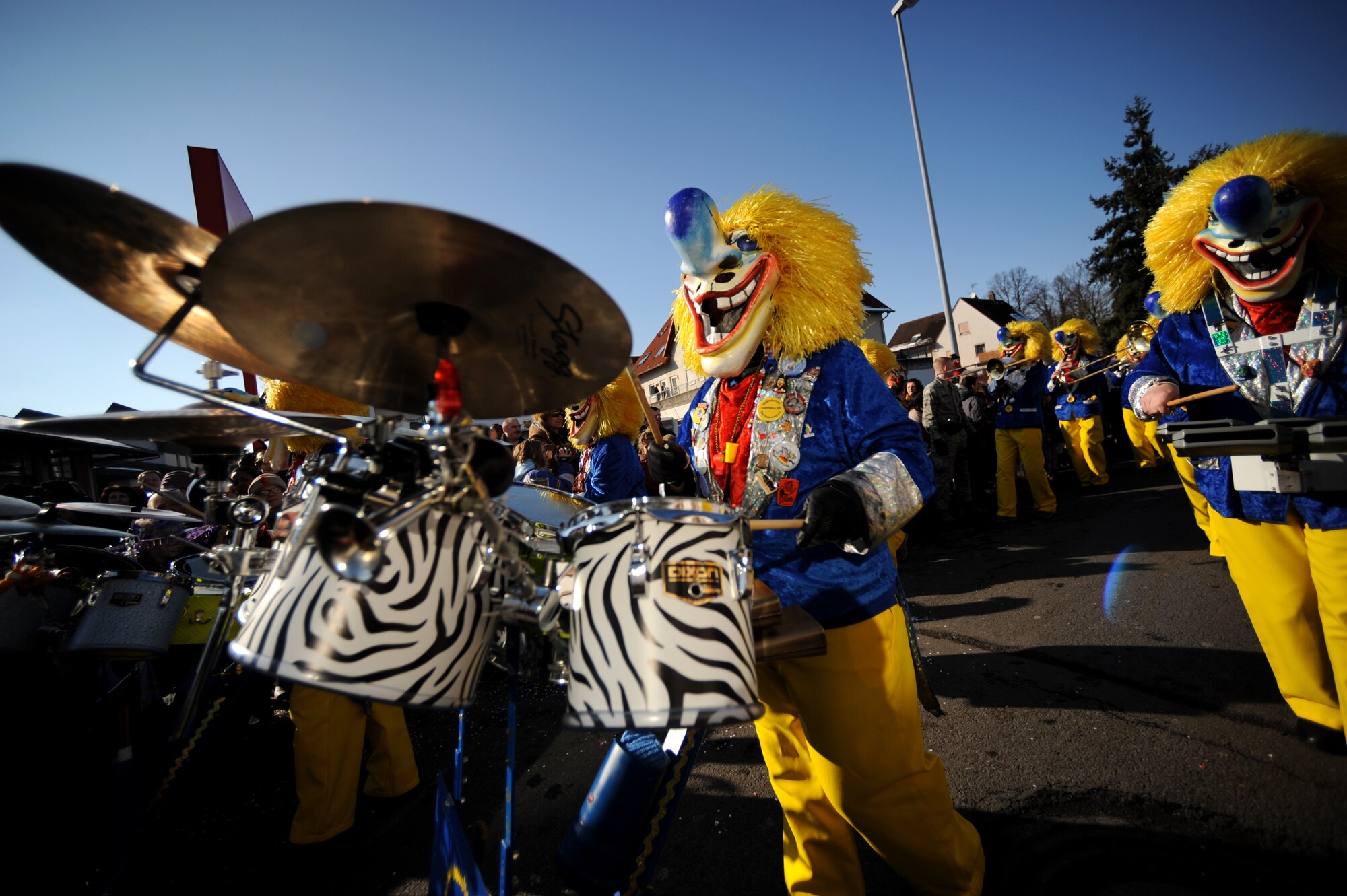Members of the local community participate in the Fasching parade in Ramstein village, Germany, Feb. 16, 2010. This annual event is a pre-Lenten carnival which is celebrated with the donning of wild and fancy costumes to chase away the evil spirits of winter in preparation for spring. (U.S. Air Force photo by Tech. Sgt. Sarayuth Pinthong)