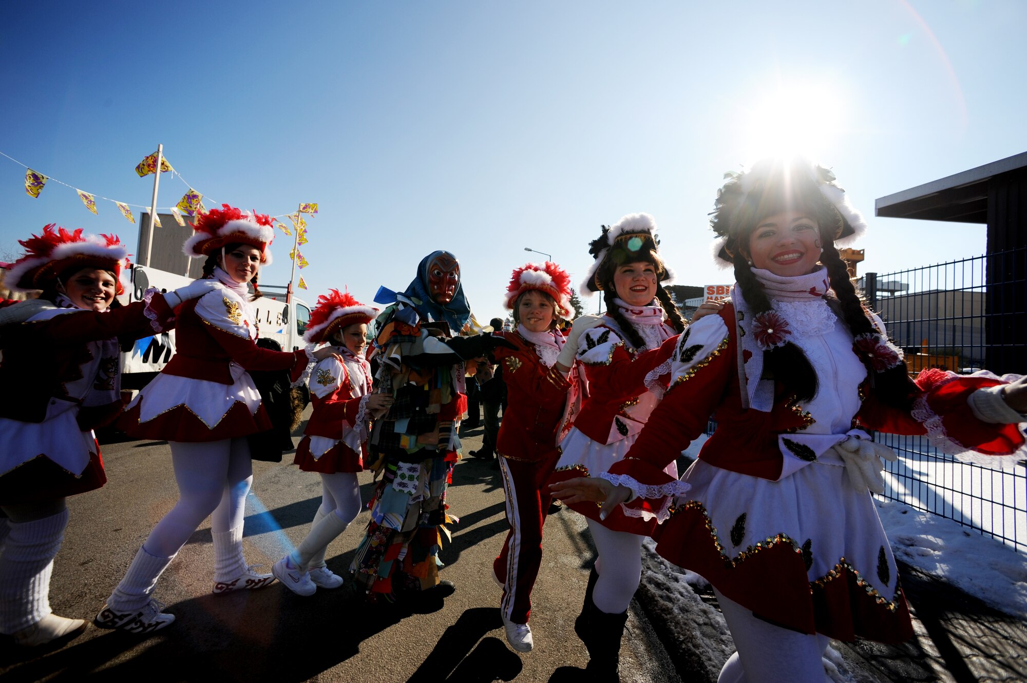 Members of the local community participate in the Fasching parade in Ramstein village, Germany, Feb. 16, 2010. This annual event is a pre-Lenten carnival which is celebrated with the donning of wild and fancy costumes to chase away the evil spirits of winter in preparation for spring. (U.S. Air Force photo by Tech. Sgt. Sarayuth Pinthong)