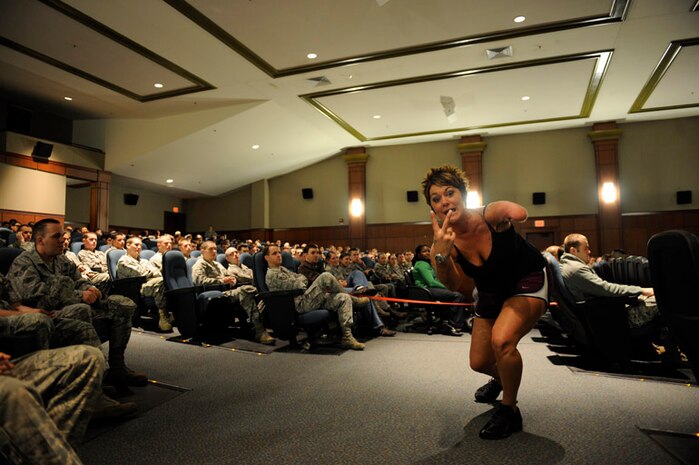 Sarah Panzau, a motivational speaker, delivers a high-energy briefing to members of Joint Team Charleston on the consequences of driving while drunk at the base theater here Feb. 9. Briefing attendance was mandatory for Airmen through the age of 25, but the theater was filled with attendees of all ages who came out for the meaningful event. (U.S. Air Force photo/Airman 1st Class Jeremy Burns)