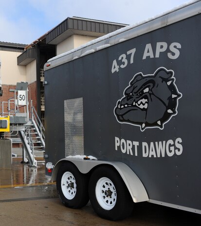 The 437th Aerial Port Squadron's mascot grimaces after an overnight snowstorm delivered more than three inches of snow to Joint Base Charleston Feb. 13. During the recent winter months, nightly low temperatures have dropped, requiring additional safety measures during cargo loading operations due to ice formation. During the early hours of the storm, Airmen with the 437 APS successfully loaded two aircraft with cargo amidst the blustering snow. (U.S. Air Force photo/Senior Airman Daniel Owen)
