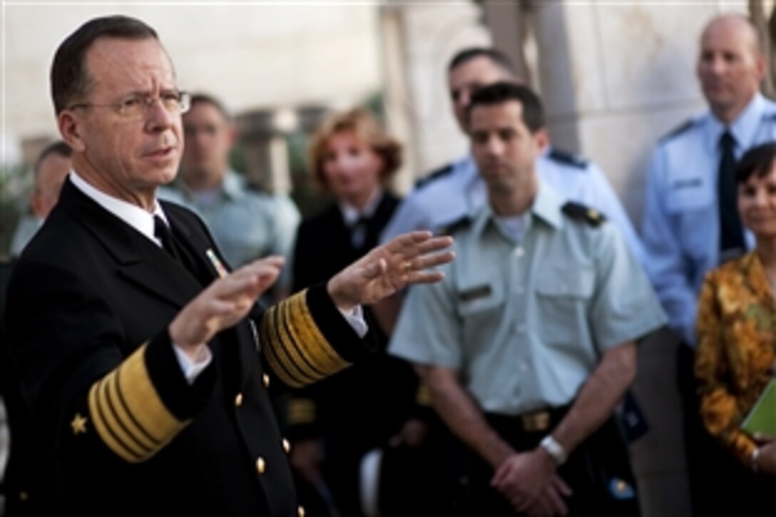 U.S. Navy Adm. Mike Mullen, chairman of the Joint Chiefs of Staff, speaks with U.S. civilians and troops assigned to the U.S. Embassy in Amman, Jordan, Feb. 16, 2010. Mullen is touring the region, visiting with key partners and allies.