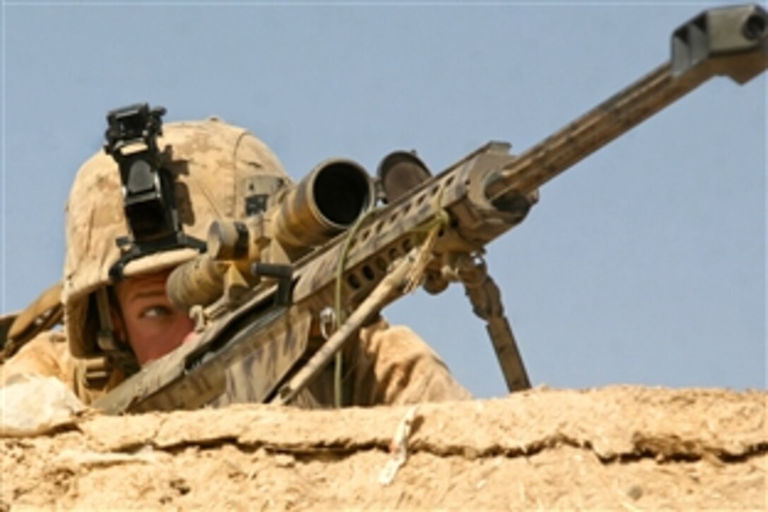 U.S. Marine Corps Lance Cpl. Mark Trent provides security inside a compound in Marja, Helmand province, Afghanistan, Feb. 16, 2010. Trent is assigned to India Company, 3rd Battalion, 6th Marine Regiment.