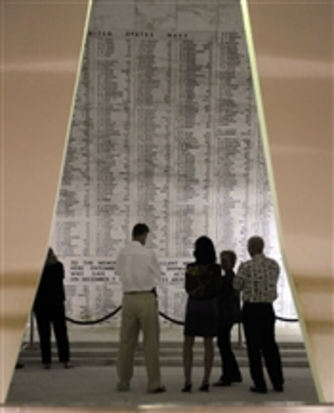 Deputy Secretary of Defense William J. Lynn III and wife Mary Murphy listen to the Commander of the U.S. Pacific Command Adm. Robert F. Willard while taking a tour of the USS Arizona Memorial in the Honolulu Harbor, Hawaii, on Feb. 16, 2010.  