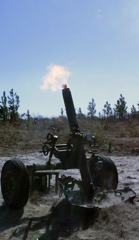 A mortar explodes out of the expeditionary fire support M327 120mm towed mortar system, as Marines with Fox Battery, 2nd Battalion, 12th Marine Regiment, 2nd Marine Division practice a call-for-fire training mission aboard Marine Corps Base, Camp Lejeune, N.C., Feb.17, 2010. The unit is third in the Marine Corps to qualify on the system, preparing them for their upcoming attachment to the 26th Marine Expeditionary Unit this fall.
