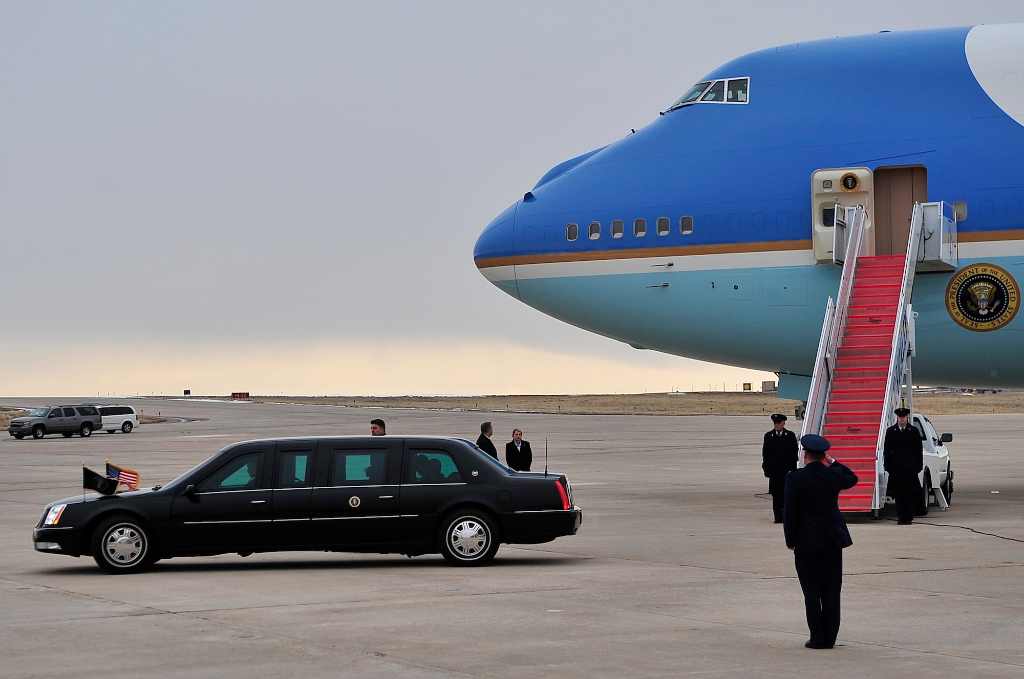 BUCKLEY AIR FORCE BASE, Colo. -- Col. Clint Crosier, 460th Space Wing commander, salutes President Barack Obama as he departs the flightline Feb. 18. President Obama is attending a fund-raiser in Denver this week. (U.S. Air Force photo by Senior Airman Kathrine McDowell)
