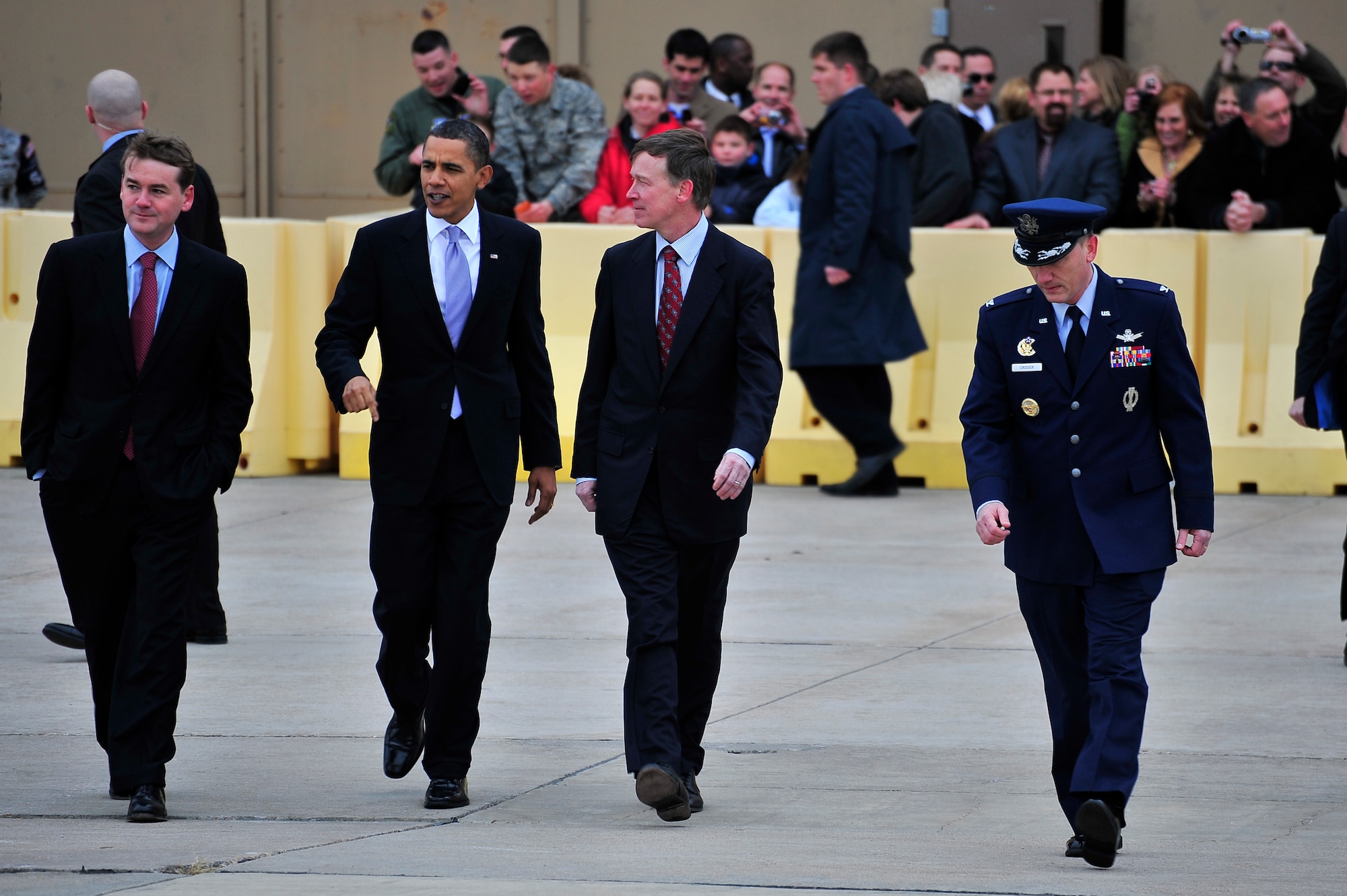 BUCKLEY AIR FORCE BASE, Colo. -- President Barack Obama is escorted by Col. Clint Crosier, 460th Space Wing commander, Feb. 18. President Obama is attending a fund-raiser in Denver this week. (U.S. Air Force photo by Senior Airman Kathrine McDowell)
