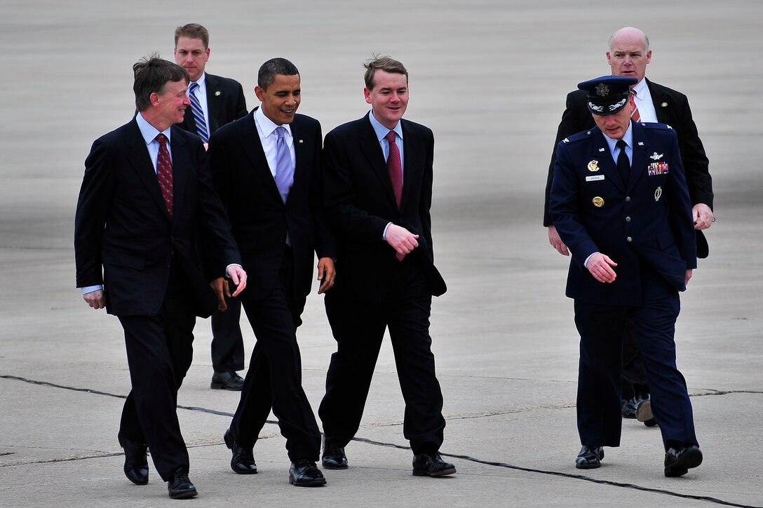 BUCKLEY AIR FORCE BASE, Colo. -- President Barack Obama is escorted by Col. Clint Crosier, right, 460th Space Wing commander, Feb. 18. President Obama is attending a fund-raiser in Denver this week. (U.S. Air Force photo by Senior Airman Kathrine McDowell)