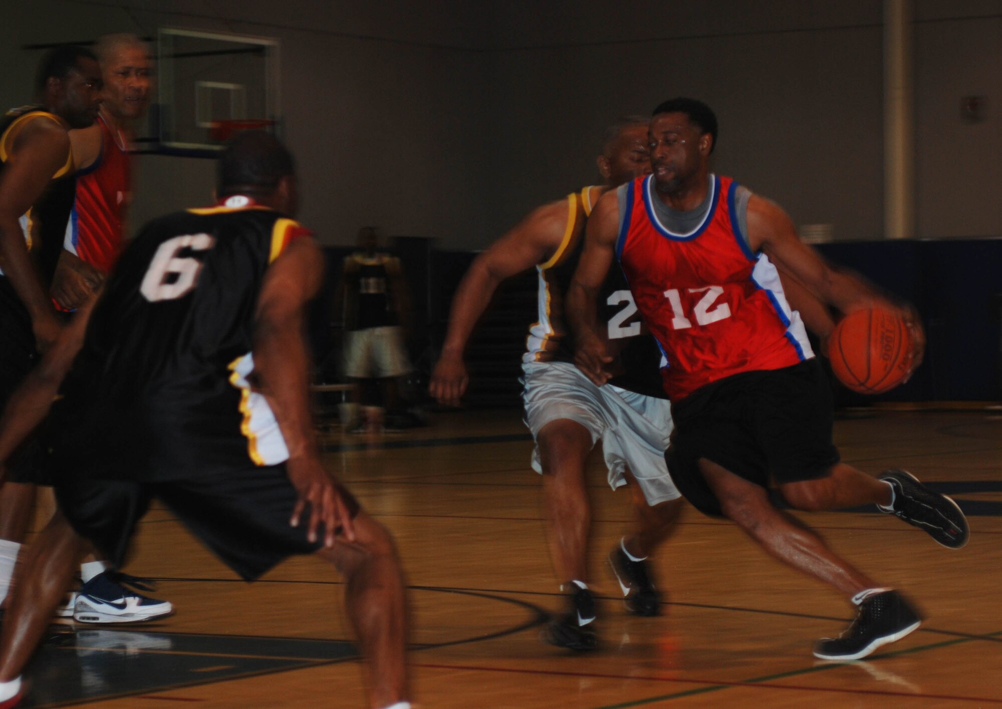 Players compete in the March Air Reserve Base intramural basketball championship game Feb. 16, 2010. (U.S. Air Force photo by Staff Sgt. Kevin Chandler)