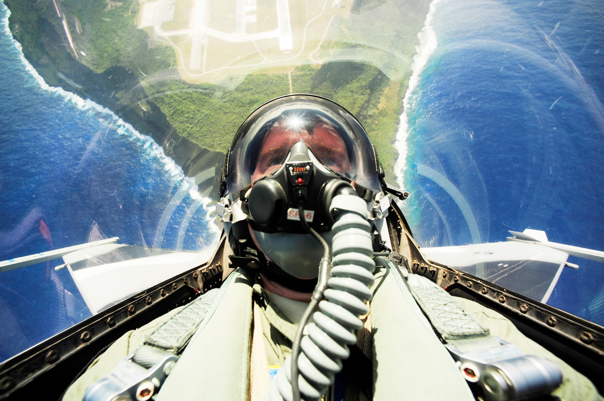 An F-16 Fighting Falcon pilot conducts an unrestricted vertical climb from Andersen Air Force Base, Guam, during Exercise Cope North, Feb. 15, 2010. The U.S. Air Force and the Japan Air Self-Defense Force conduct the exercise annually at Andersen to increase combat readiness and interoperability.  (U.S. Air Force photo/Staff Sgt. Jacob N. Bailey)